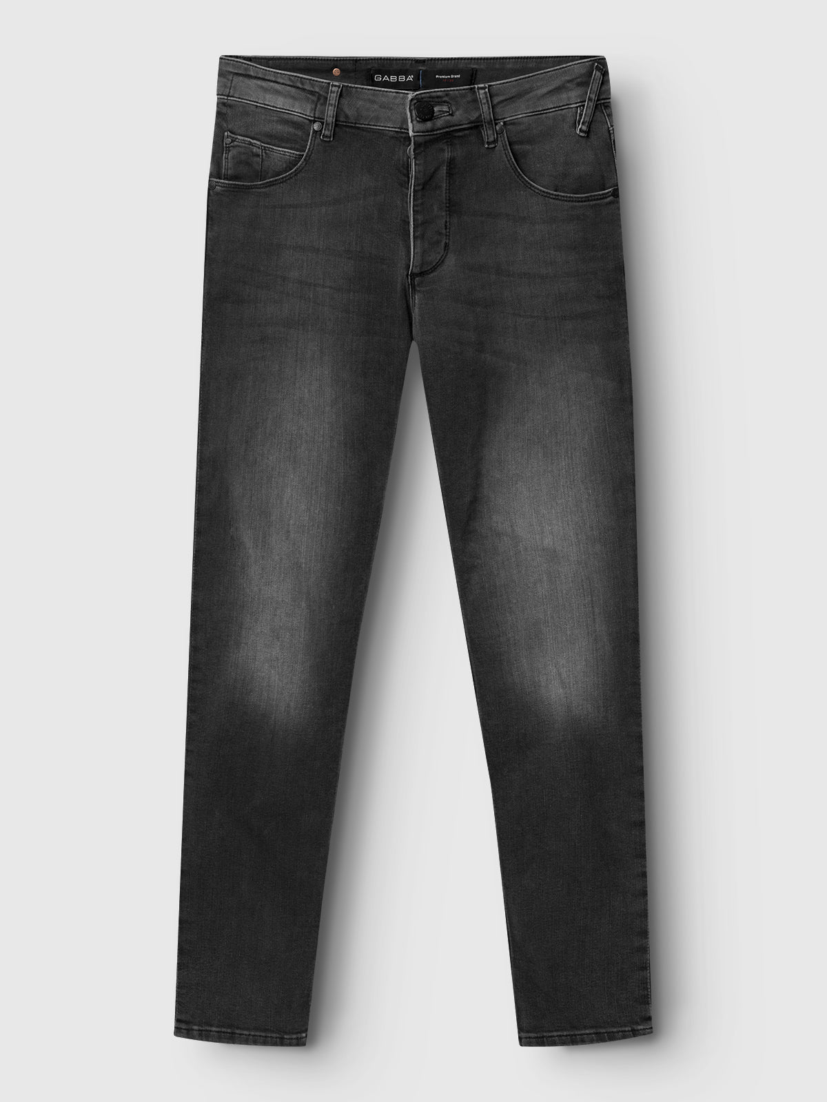 The GABBA GABrey Thor Jeans in denim wash are black slim fit jeans with five pockets and subtle faded details on the thighs and knees, ideal for a laid-back look, shown laid flat on a light gray background.