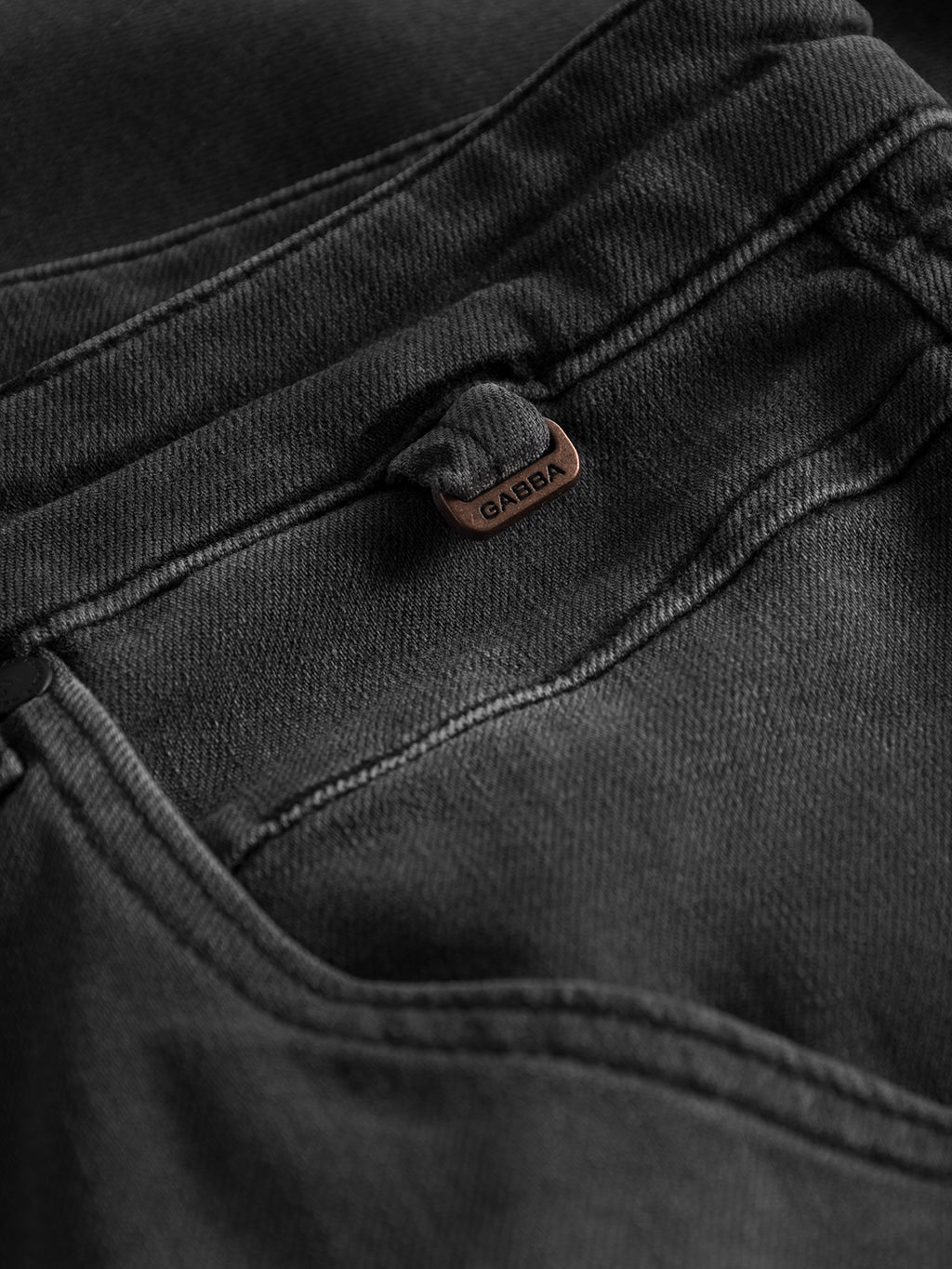 Close-up of GABBA GABalex Thor Cropped Jeans in denim wash, highlighting the front pocket with detailed stitching, small GABBA metal tag, and a modern fit with relaxed crotch design for superior comfort and style.