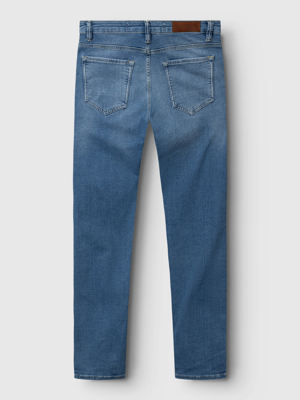 The GABBA GABjones K2615 Lt. denim wash jeans are blue slim-fit jeans shown from the back with two back pockets, belt loops, and a brown leather patch. Made from super-stretch fabric, they're laid flat on a white background.