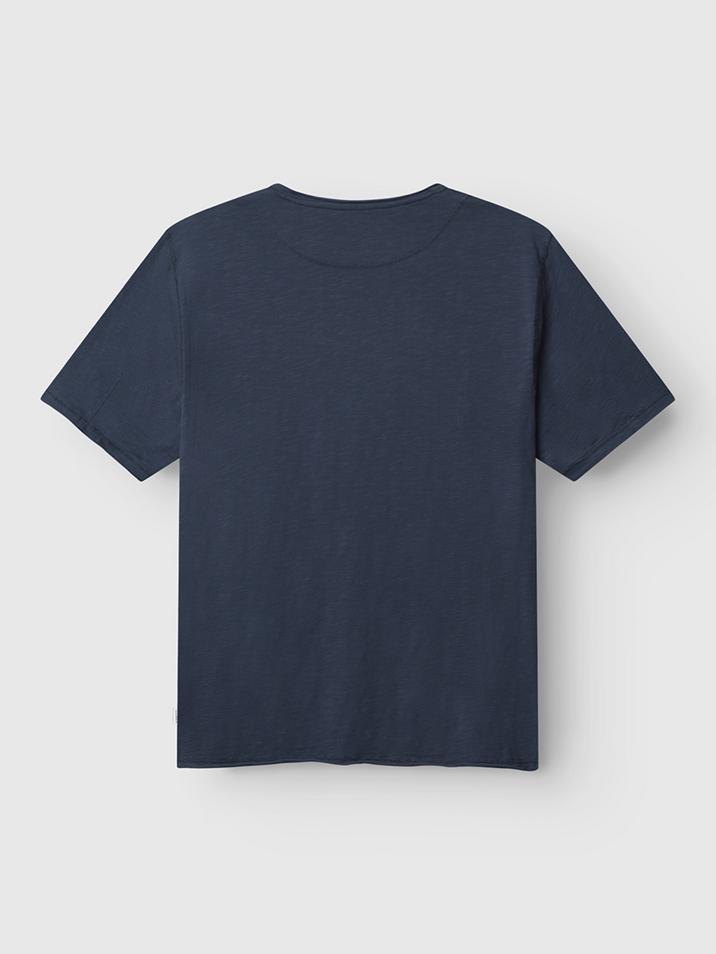 The Kostant New SS - Navy T-shirt by Gabba is displayed flat, back facing up on a light gray background, showcasing its classic regular-fit silhouette and short sleeves.