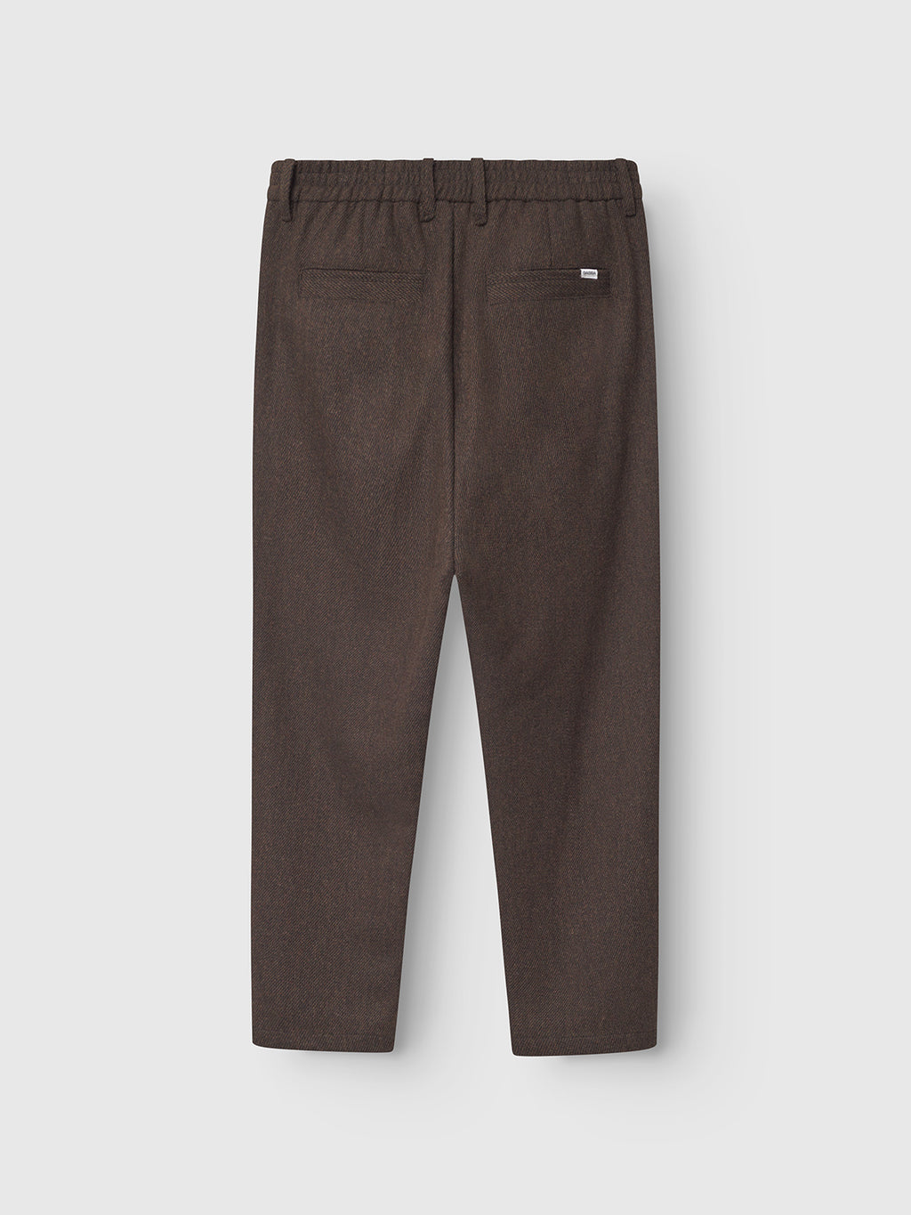 The Gabba Monza Wook - Brown dress pants feature an elastic waistband, belt loops, and two back welt pockets, shown flat against a plain light background.
