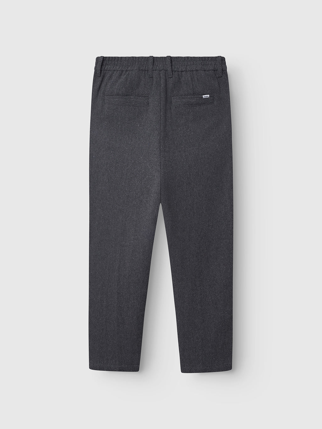 Back view of Gabba Monza Wook trousers in dark gray, featuring an elastic waistband and two back welt pockets, shown against a plain light background.