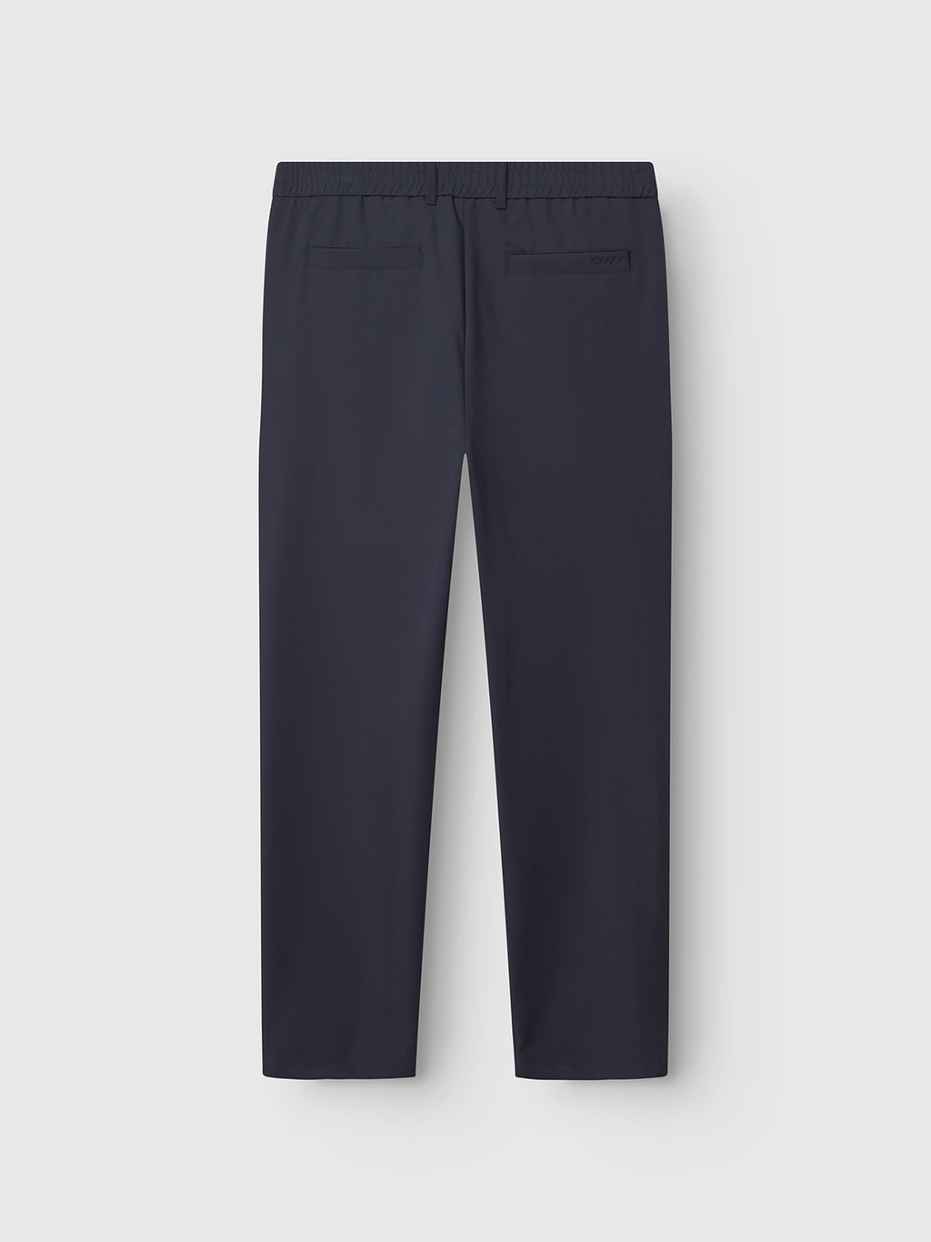 The Gabba Napoli 19 Bascu - Navy straight fit trousers are shown from the back with two welt pockets and an elastic waistband, set against a plain light gray background.