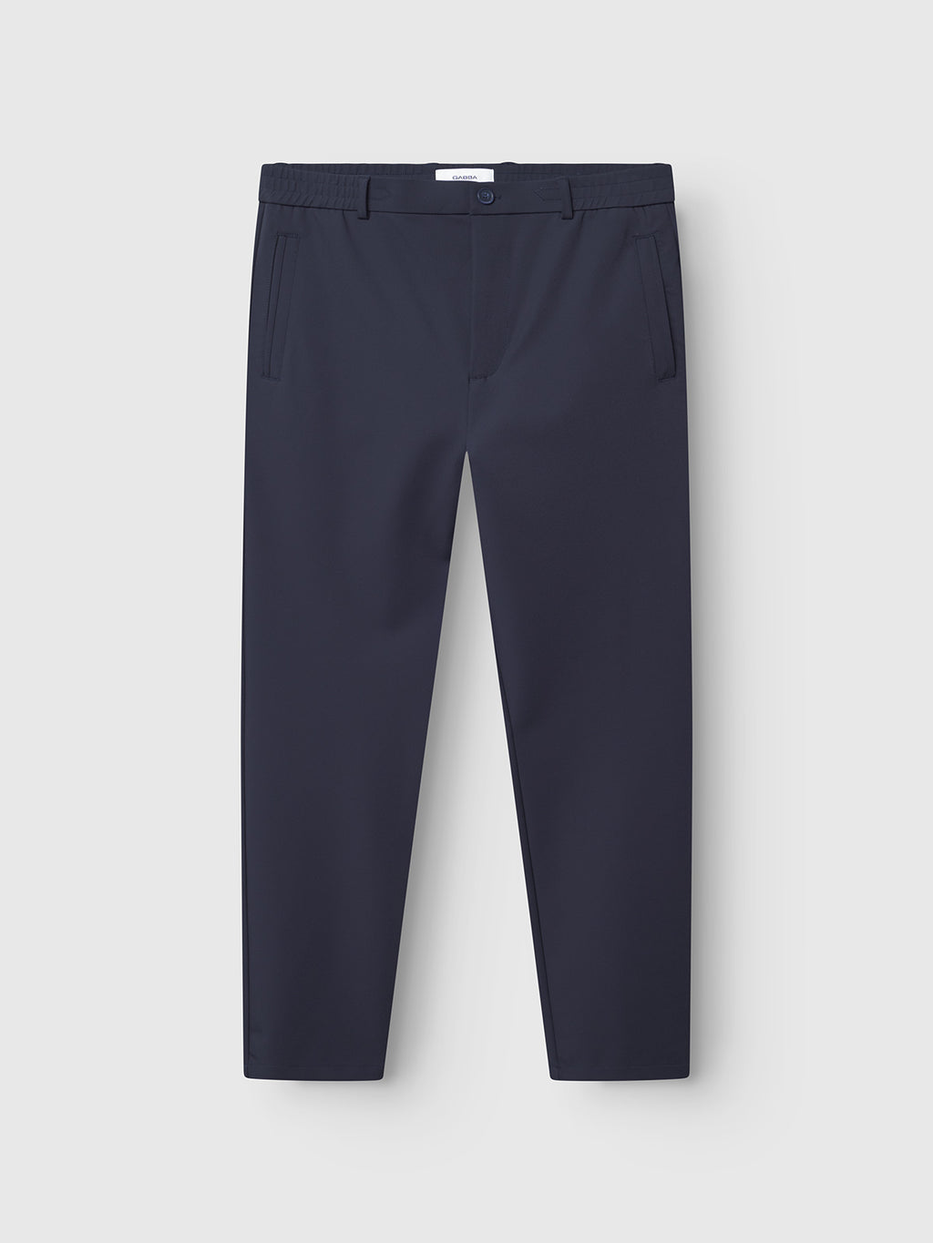 The Gabba Monza Bascu - Navy tailored pants feature a straight-leg fit, lightweight waterproof and wrinkle-resistant fabric, front slant pockets, and a single button waist closure, displayed on a plain white background.