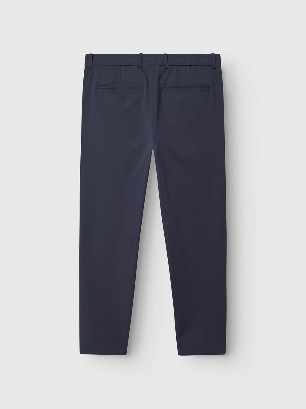 Monza Bascu - Navy by Gabba shown from the back, features two welt pockets and an elastic waistband, made from lightweight waterproof fabric.