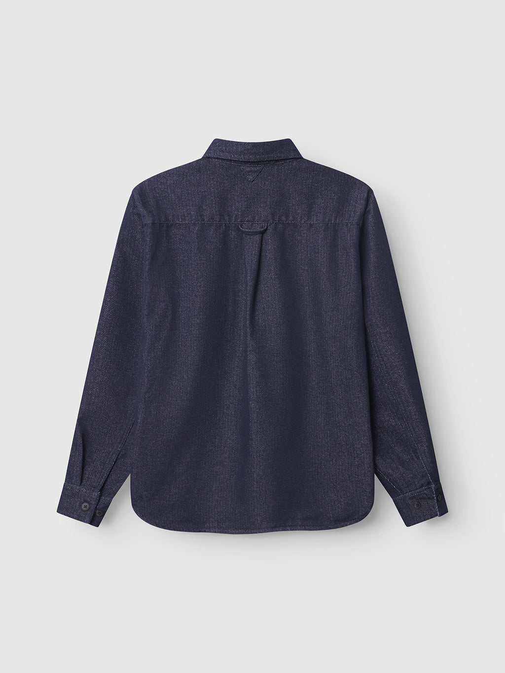 The Gabba Sven Reg Chev - Dark Navy is a long-sleeved denim shirt with a classic collar, buttoned cuffs, back yoke with loop, and center pleat—timeless workwear style shown from the back.