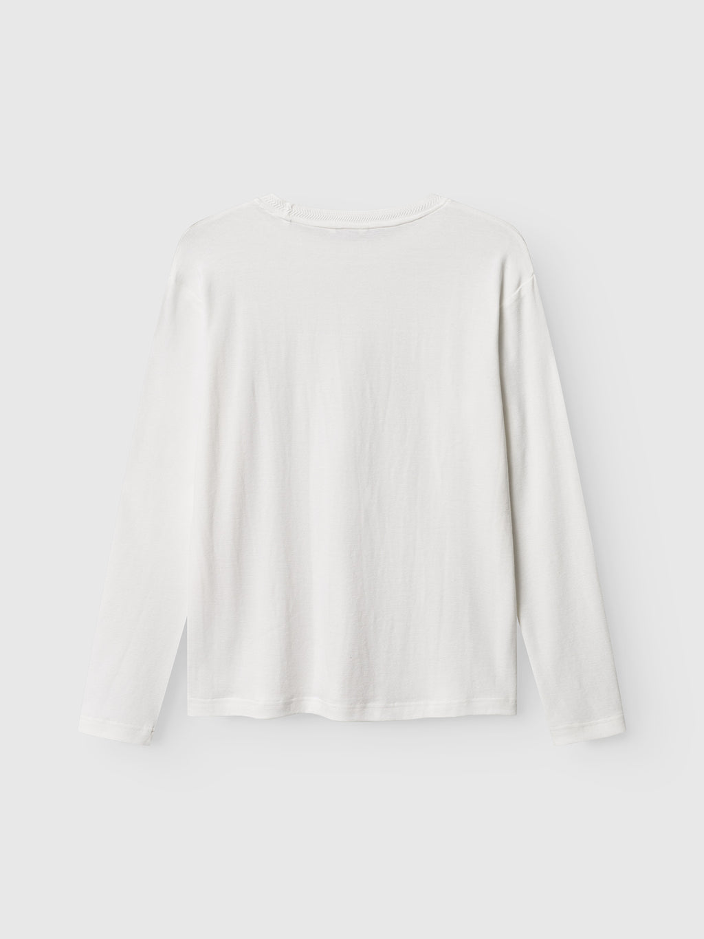 The Gabba Dune Brush LS in off white, a regular fit long-sleeve tee, is shown from the back against a light gray background.