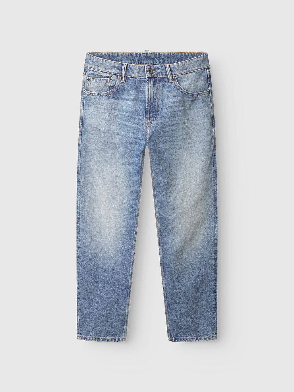 The Carl Prag Lt. Blue Denim jeans by Gabba are straight-leg, light blue with a worn look, button and zip closure, front and back pockets, and subtle thigh fading, shown against a plain white background.
