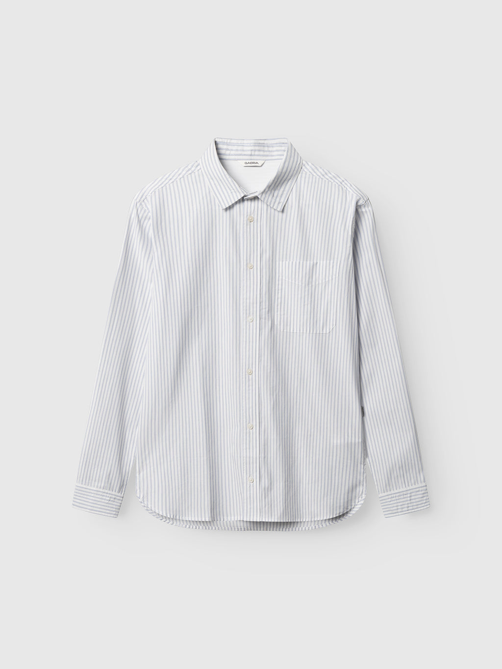 The Gabba Sven Reg Clo Ls - White Stripe is a regular-fit, long-sleeve button-up shirt with a collar and thin blue and white vertical stripes, shown against a plain light gray background.