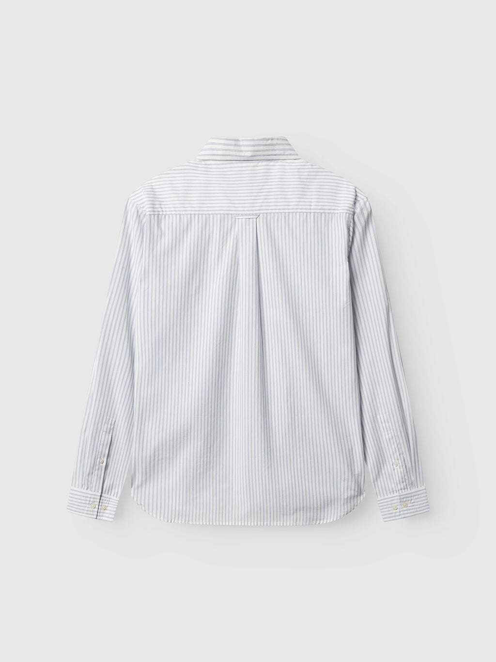 The Sven Reg Clo Ls - White Stripe by Gabba is displayed laid flat, back facing up, showing its regular fit and blue and white vertical stripes against a plain light background.