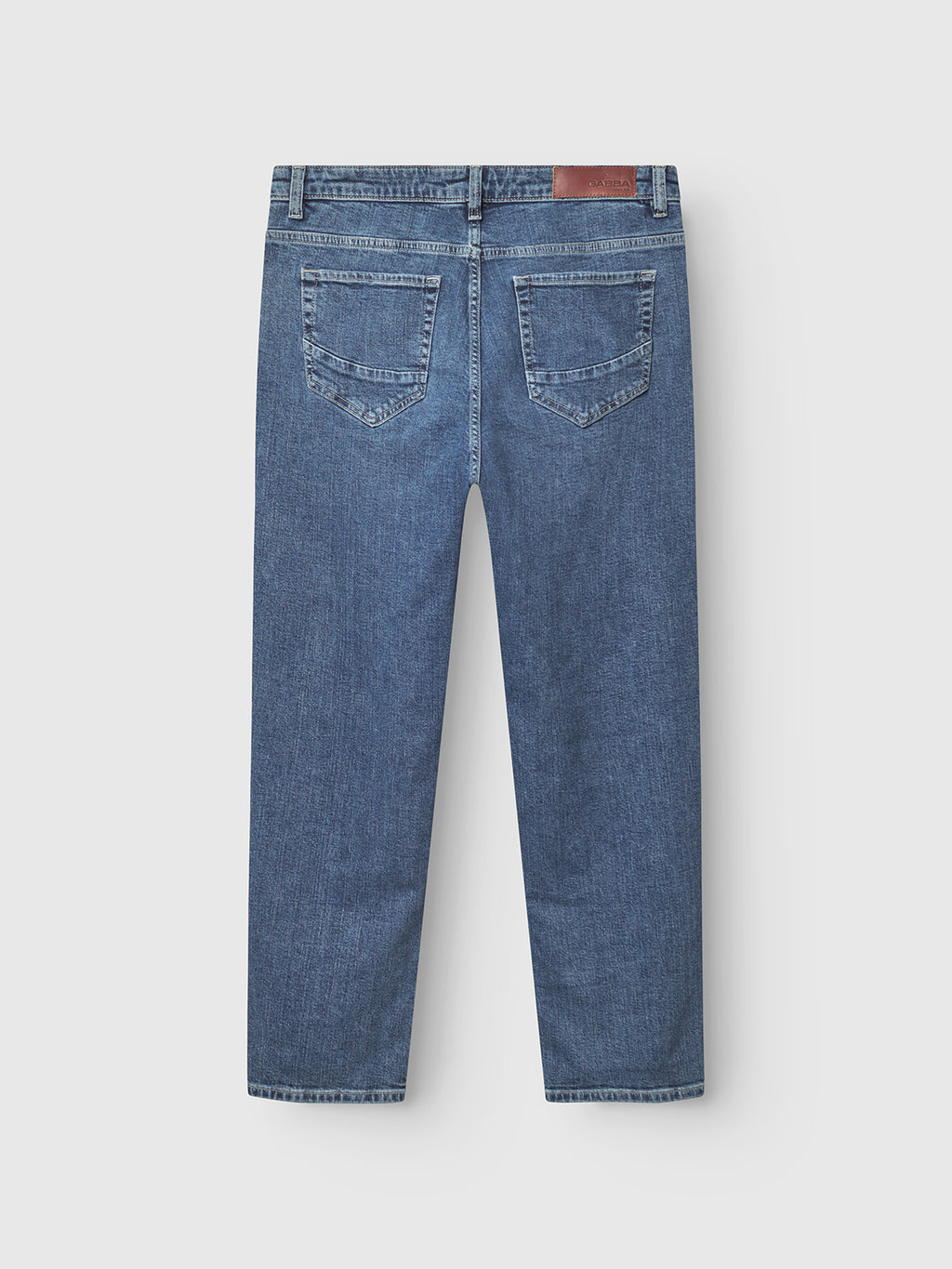 The Marc Jingo - Dark Blue Denim jeans by Gabba feature a straight-leg fit, two back pockets, belt loops, and a brown leather patch on the waistband. Designed for classic style and comfortable stretch.