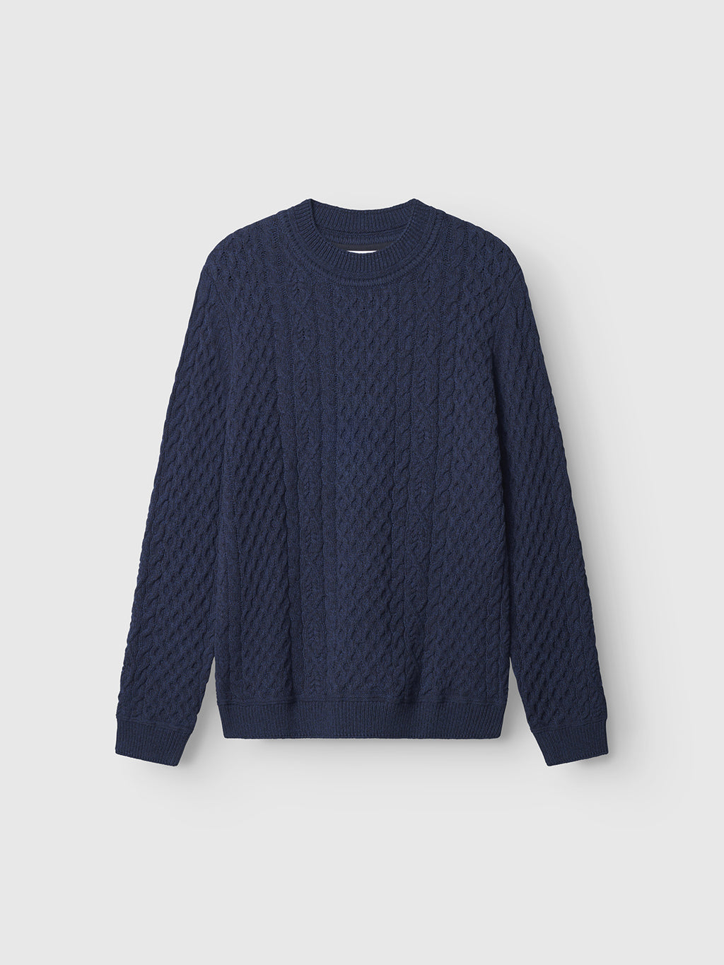 The Gabba Tokyo Cable LS - Navy is a men’s long-sleeve cable knit sweater with a crew neckline, shown against a plain light gray background.