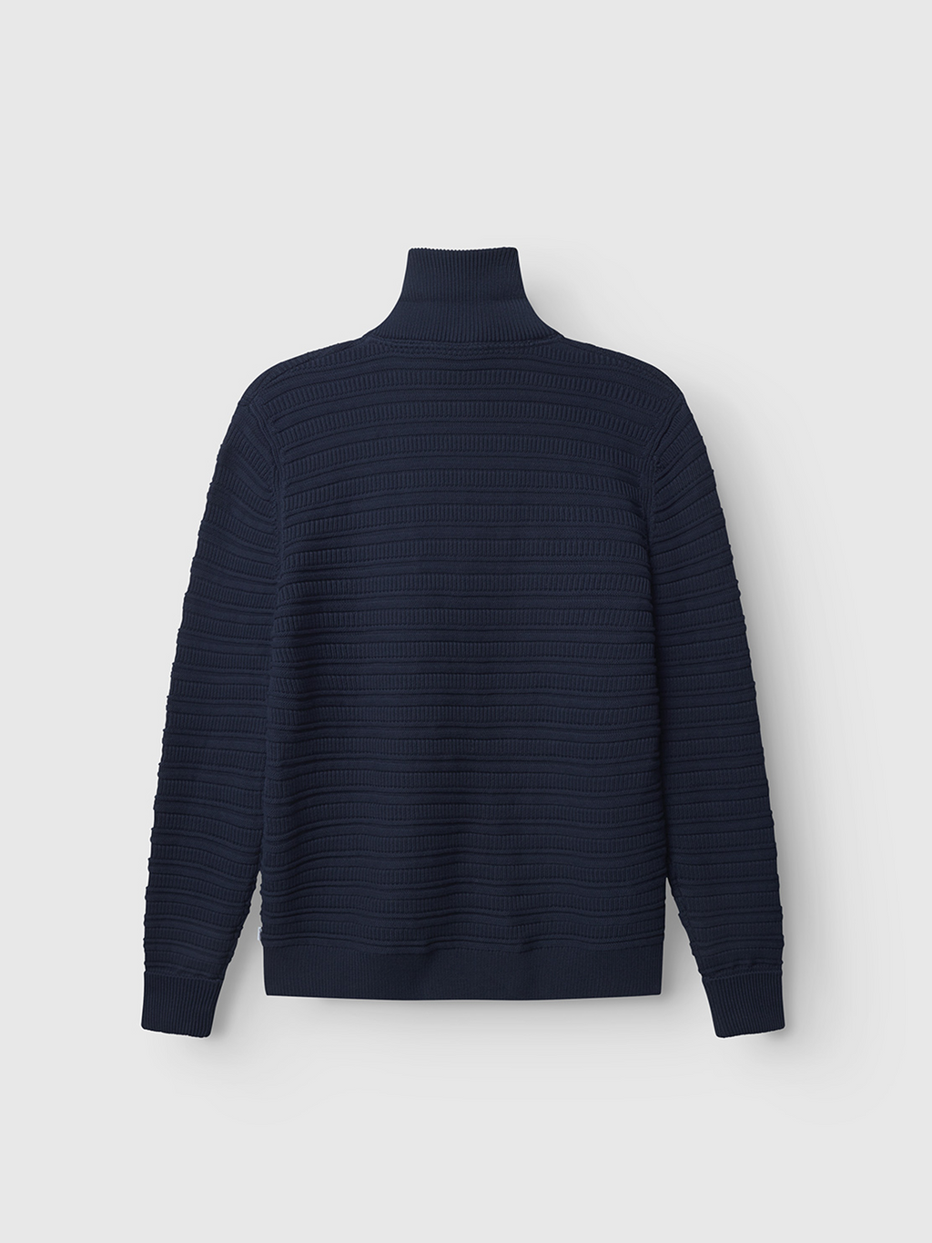 The Gabba Iwaki Buco LS in navy is a long-sleeve ribbed cotton jumper with a high turtleneck collar, shown from the back against a plain white background.