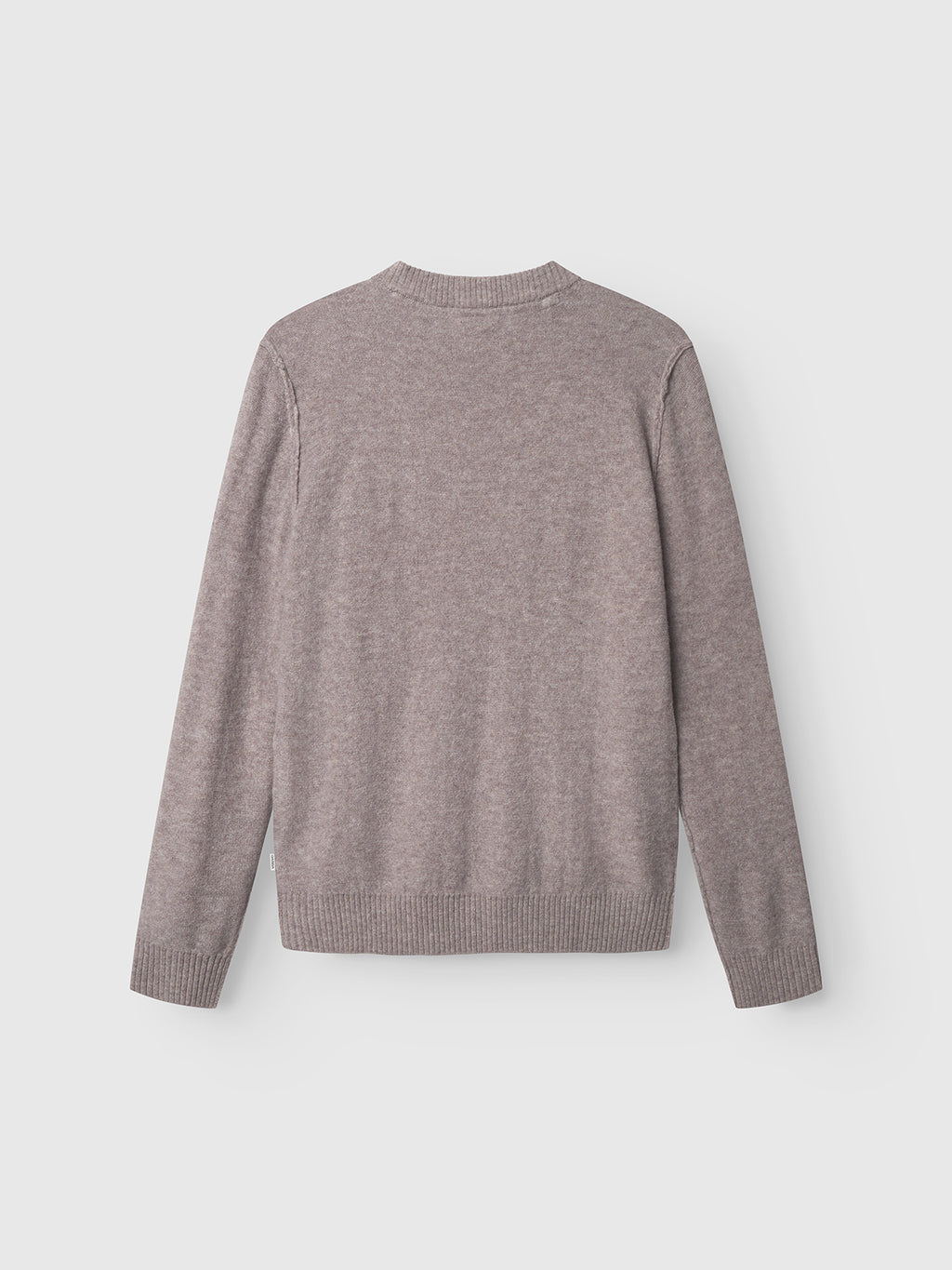 The Gabba Tokota Aico LS in light brown is a long-sleeve Merino sweater with a crew neck and ribbed cuffs and hem, shown from the back against a plain white background.