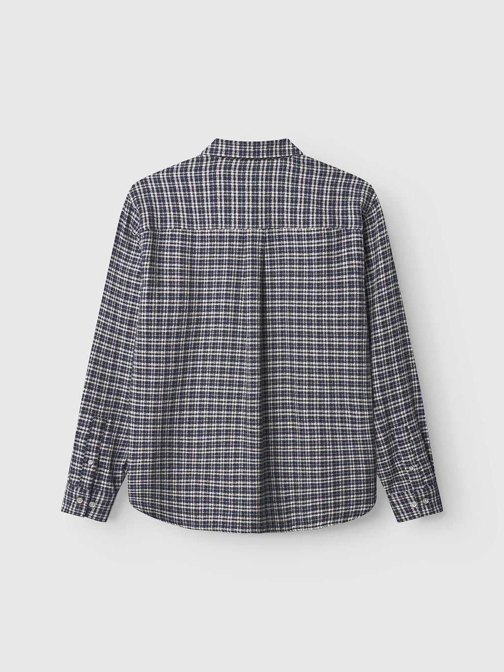 The Gabba Sven reg TX LS - Blue Check is a 100% cotton long-sleeve shirt featuring a blue, white, and black plaid pattern, shown from the back against a white background.