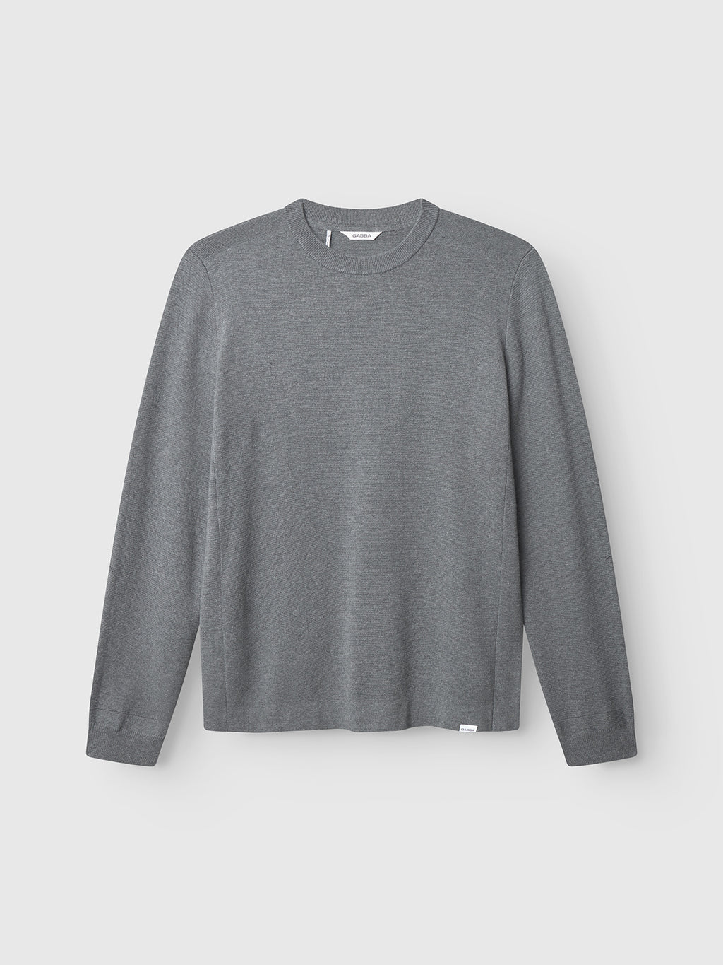 The Gabba Blanko New LS - Dk. Grey Mel, a long-sleeve crew neck sweater in solid dark gray Milano knit, is displayed against a light gray background.
