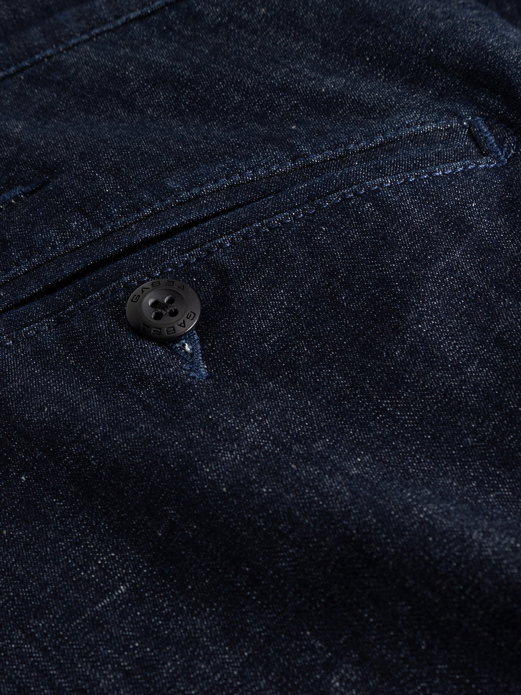 Close-up of Gabbas Paul Sisu - Dark Denim fabric, highlighting the stretch texture, pocket with black button, and detailed stitching—perfect for slim fit jeans.