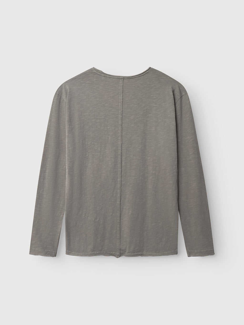The Gabba Paros Rif GWC - Grey is a long sleeve t-shirt shown from the back, laid flat on a white background. Made from super soft cotton, it features a vertical central seam for stylish detail.