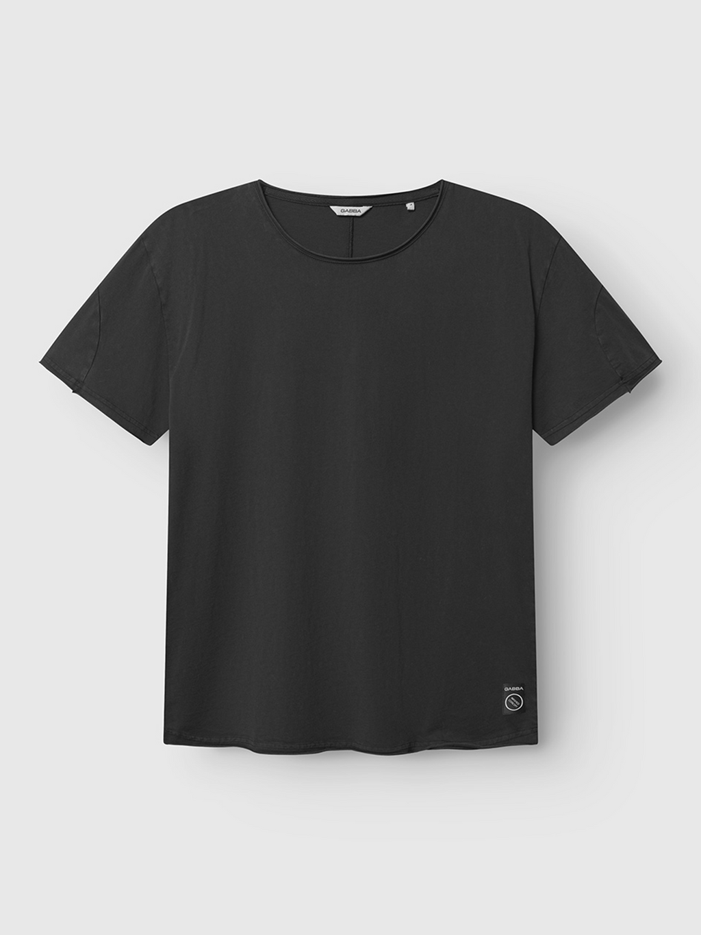 The Gabba Idra Rig GWC - Black is a regular fit t-shirt made from super soft cotton with a round neckline, shown on a light background and featuring a small rectangular label near the left bottom hem.