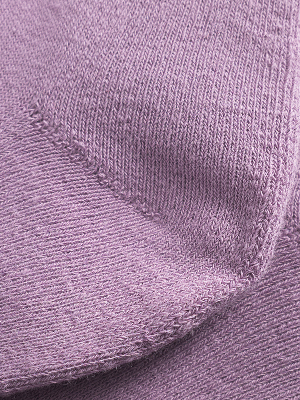 Close-up of Gabba’s Zino Socks in Dust Purple, featuring detailed diagonal and horizontal knit patterns that highlight the textured yarn—designed for premium comfort in everyday wear.