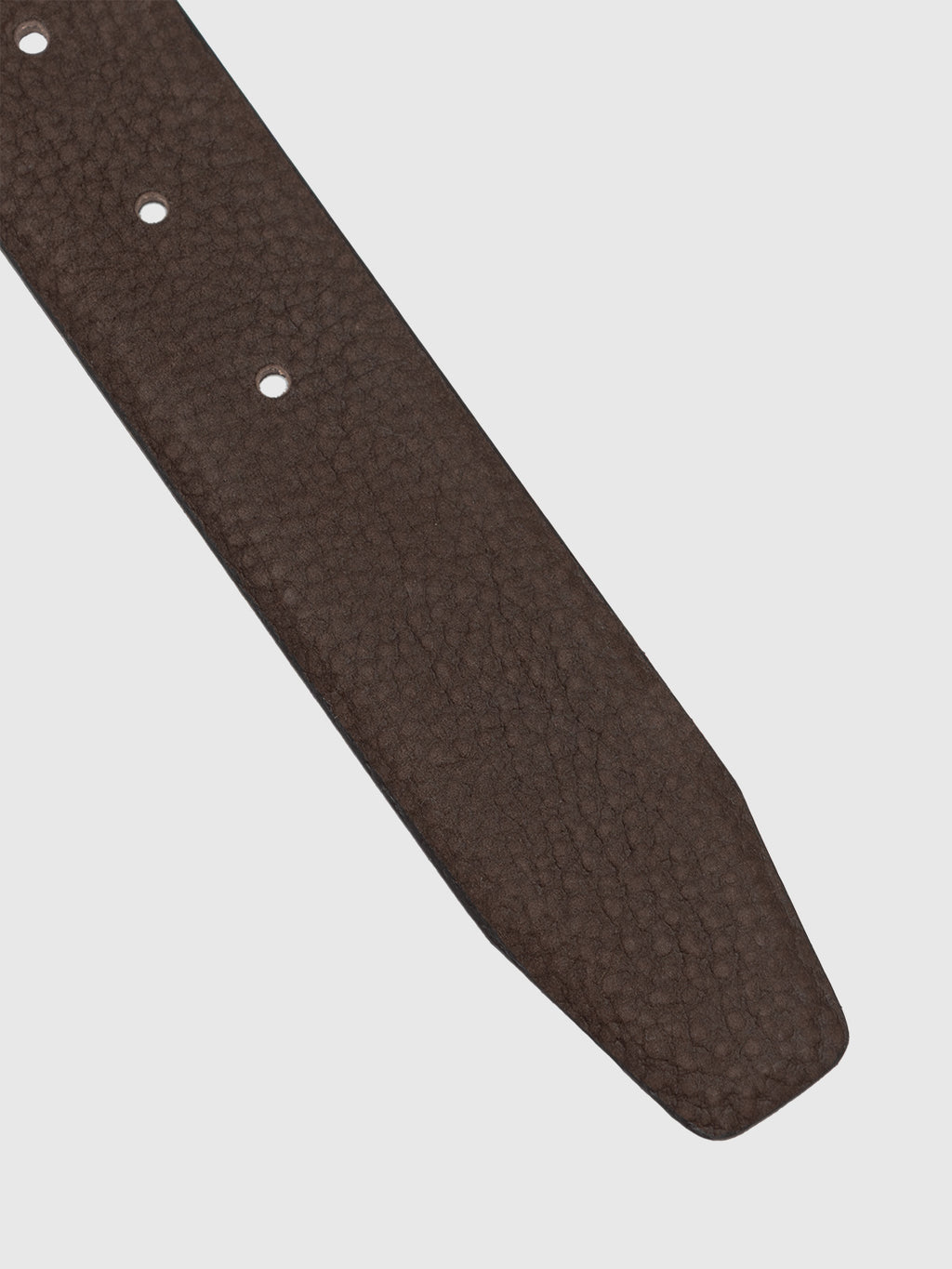 Close-up of the Buk Belt - Brown by Gabba, a classic mens dark brown leather belt with three holes, displayed on a plain white background.