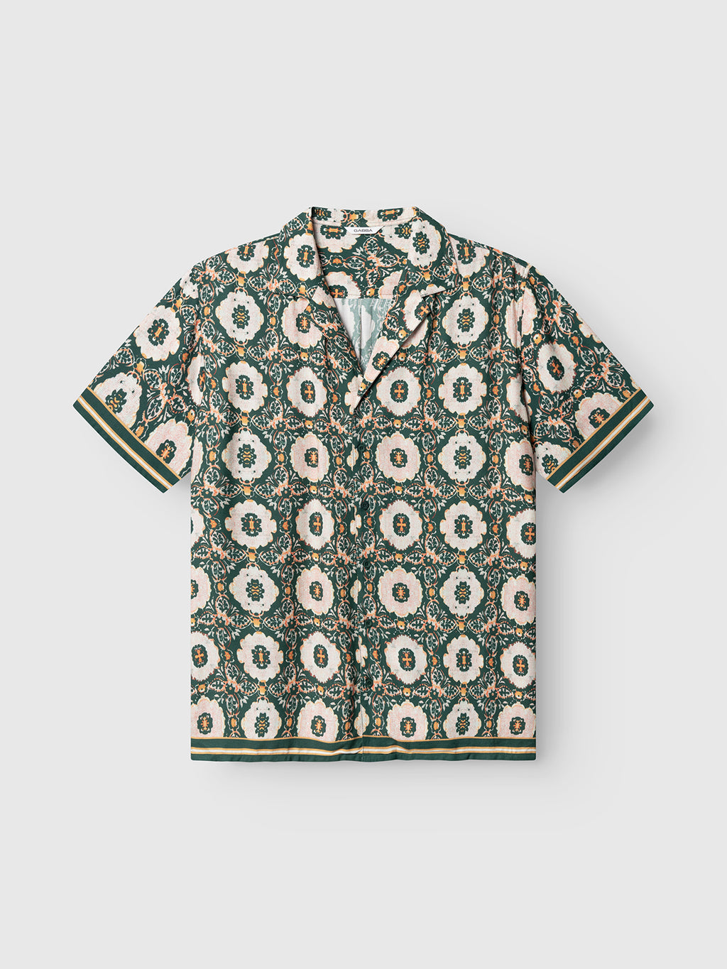 The Gabba GABsven Reg Resort Oro SS Shirt in a green pattern features short sleeves, abstract floral print, a resort collar, and striped trim on the sleeves and hem.
