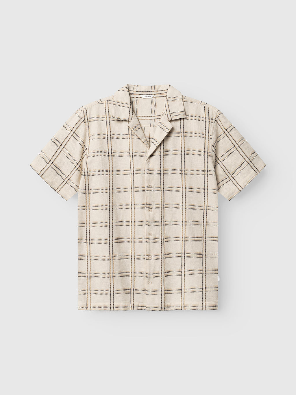 The Gabba GABsven Reg Resort Wire SS Shirt in beige check is a short-sleeve, cotton shirt with a brown and black plaid pattern, notched resort collar, and relaxed fit, shown against a plain white background.