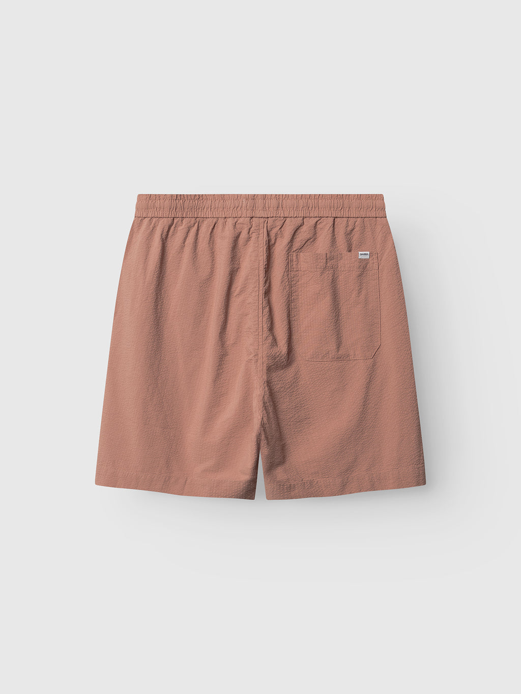 Gabba GABtommi Ker Shorts in Wood Pink, featuring an elasticated waistband and a single back pocket, shown flat on a white background.