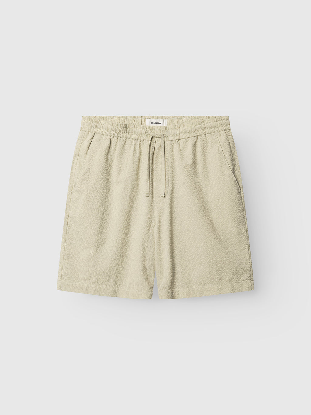 Gabba GABtommi Ker Shorts in Alfa Green feature an elasticated waistband, drawstring, and side pockets, displayed flat on a plain light background.