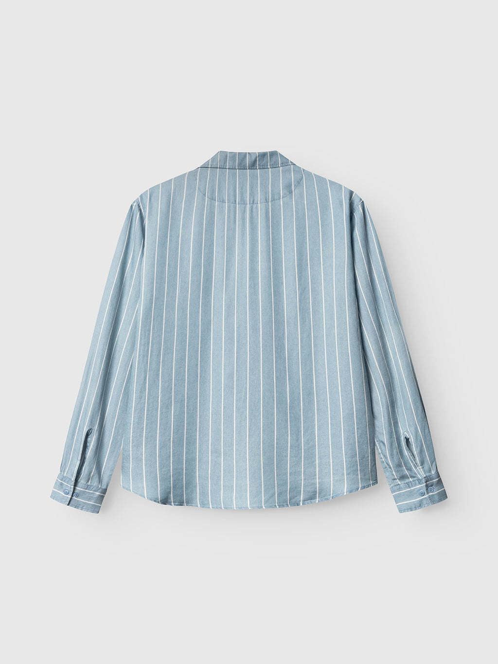 The Gabba GABtimo Resort Stripes LS Shirt in Lt. Blue Denim features vertical white pinstripes and long sleeves, shown from the back against a plain white background.
