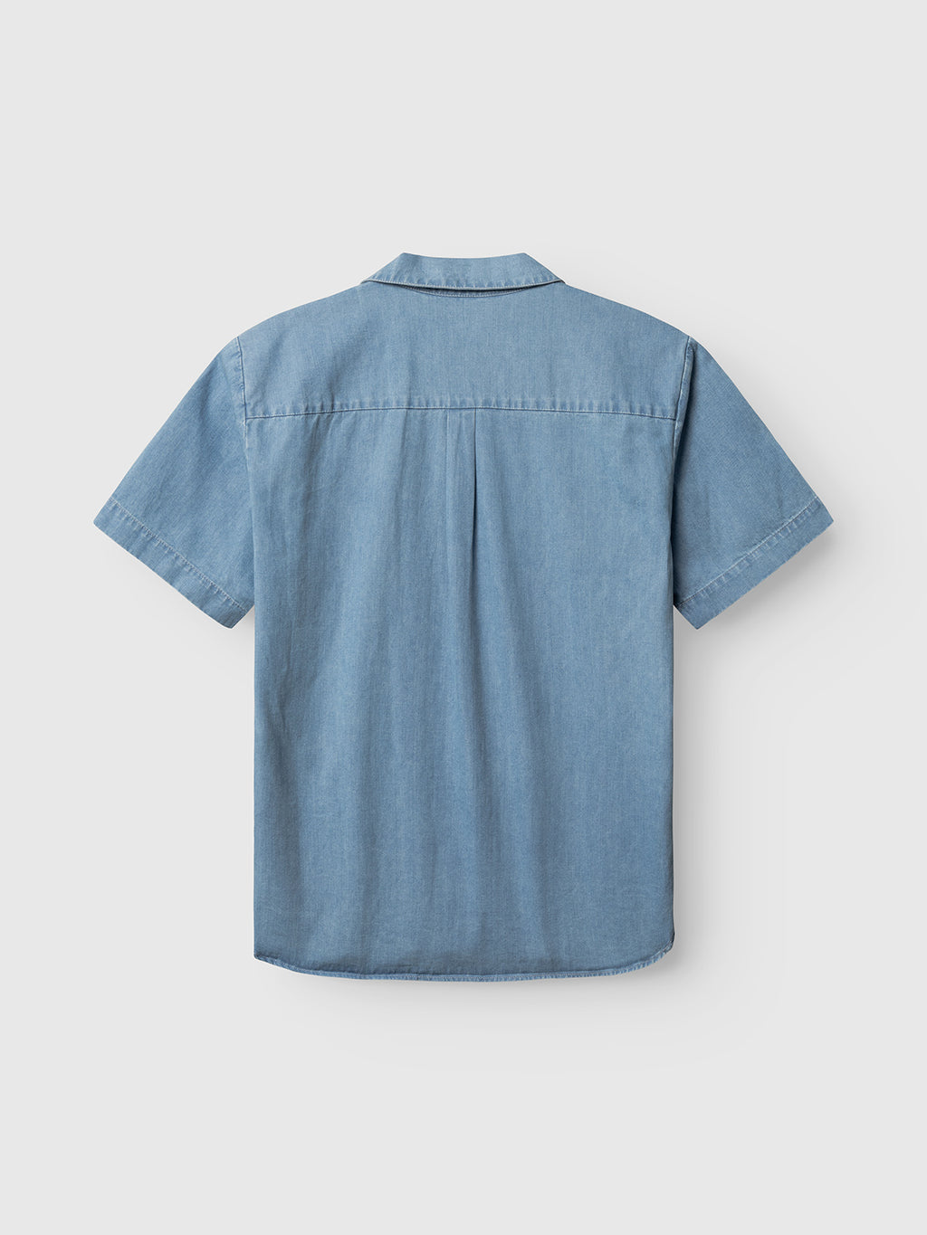 The Gabba GABtimo Resort Denim SS Shirt in light denim blue features short sleeves, a classic collar, and a back view with straight yoke and center pleat.