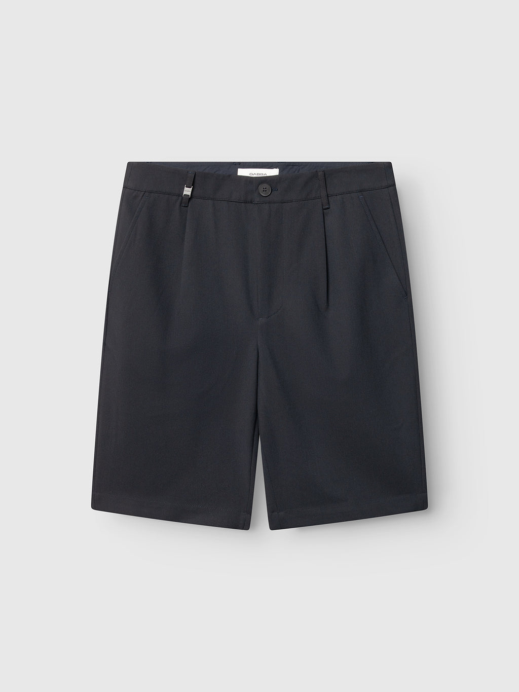 Gabba GABjoli Pas Phin Shorts GRS in blue black, featuring a relaxed fit, tailored look, flat front, side pockets, and belt loops, displayed flat on a plain light gray background.