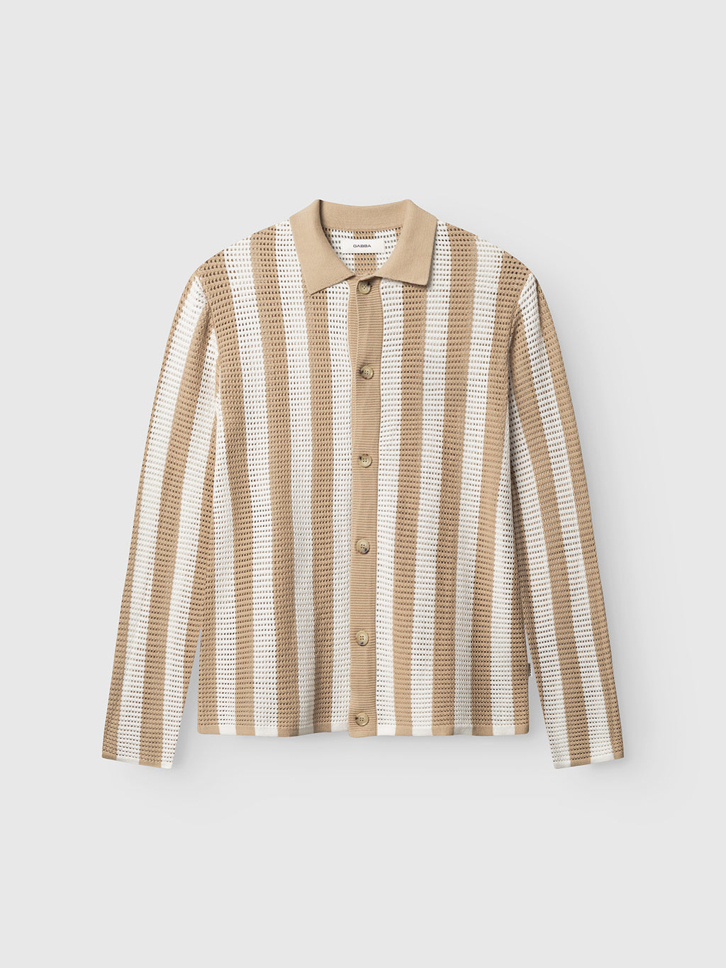 The Gabba GABdezz Bold LS Knit in beige stripe is a vintage-inspired, long-sleeve 100% cotton shirt with vertical stripes and a small collar, shown laid flat on a plain white background.