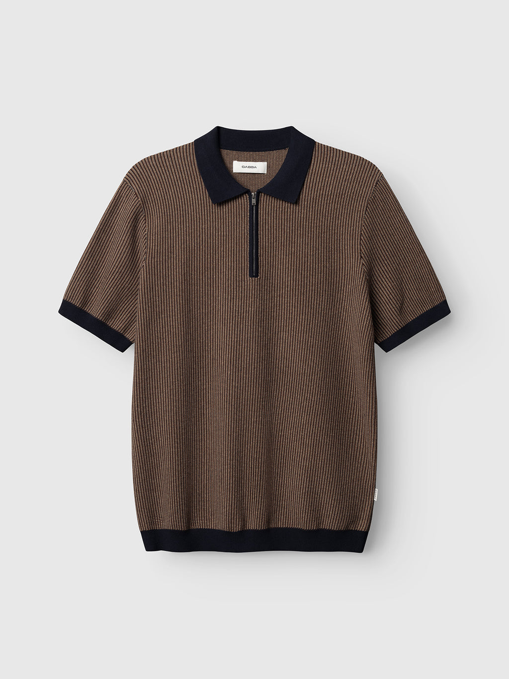 The Gabba GABoswald Retro SS Knit in navy features short sleeves, thin vertical stripes, a black collar and sleeve cuffs, and a short front zipper, displayed against a plain light background.