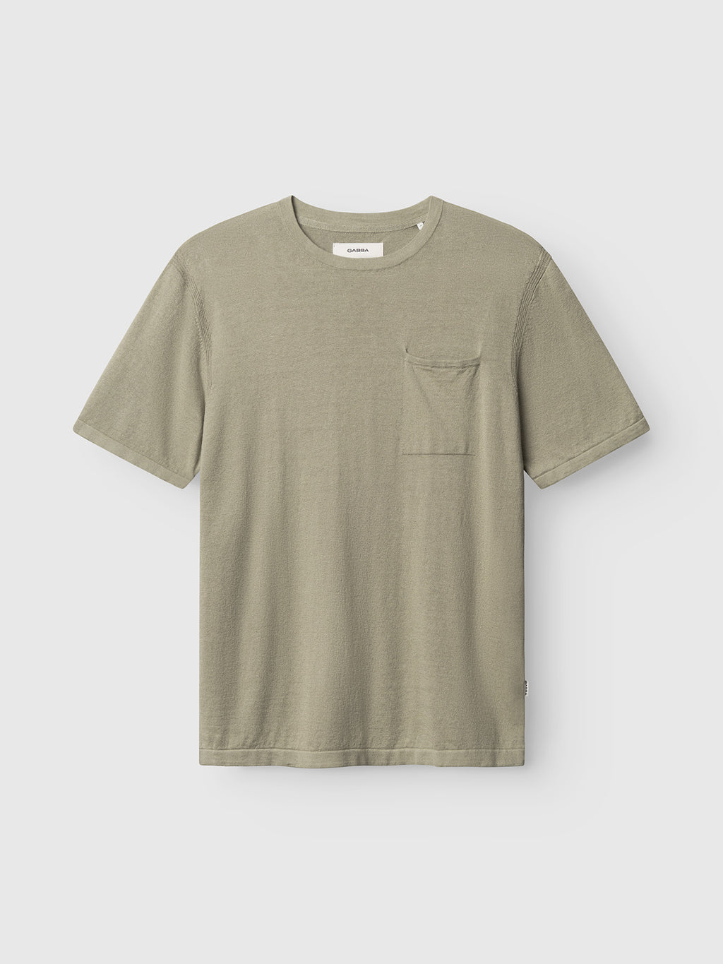 The Gabba GABvento Dush SS Knits in light green is a plain, oversized short-sleeve t-shirt with a left chest pocket, shown on a white background.
