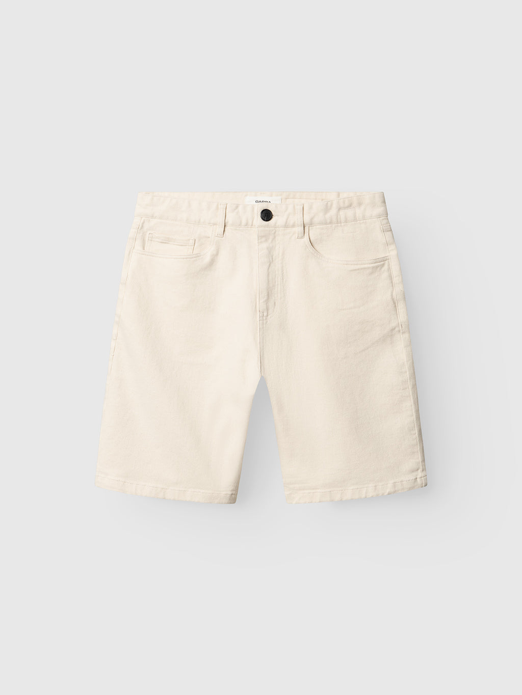 The Gabba GABmox Twill Shorts in Ecru are relaxed-fit, stretch twill shorts with front and back pockets, belt loops, and a black waistband button, shown on a plain white background.