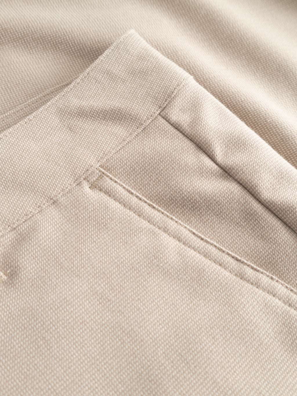 Close-up of Gabba’s GABjet Deme Shorts in Birch, featuring a textured woven fabric and neat pocket stitching—showcasing the classic slim-fit chino silhouette.