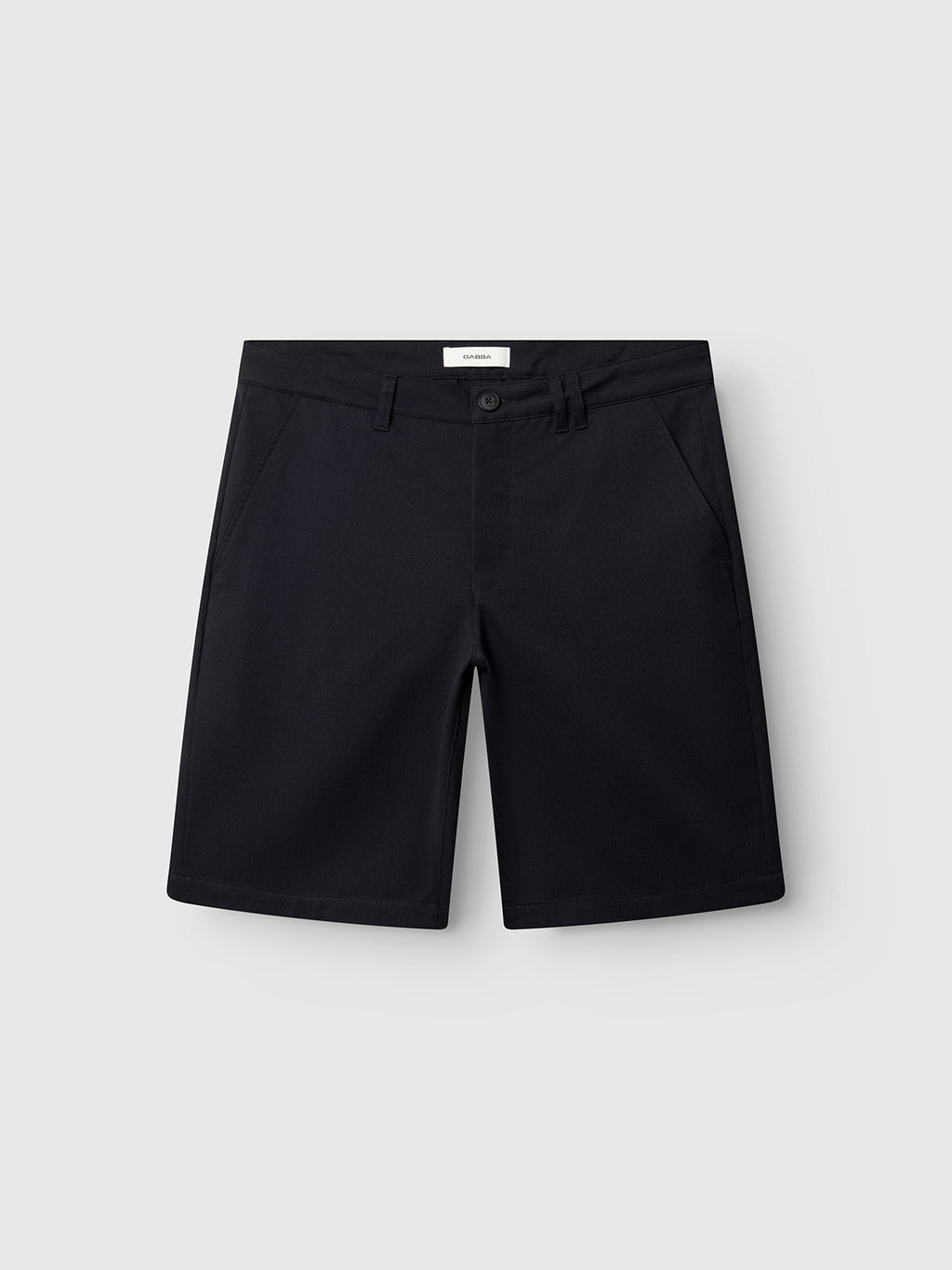 GABjet Deme Shorts by Gabba in dark navy, featuring a slim fit, classic silhouette, side pockets, belt loops, and front button closure; shown on a plain light gray background.