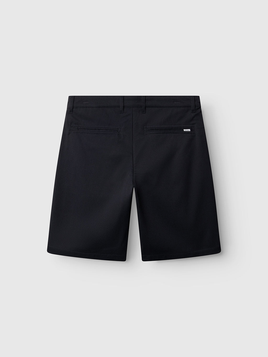 Gabba GABjet Deme Shorts in dark navy, shown from the back, feature a slim fit with two welt pockets, button closure, and a small logo tag above the right pocket against a plain light gray background.