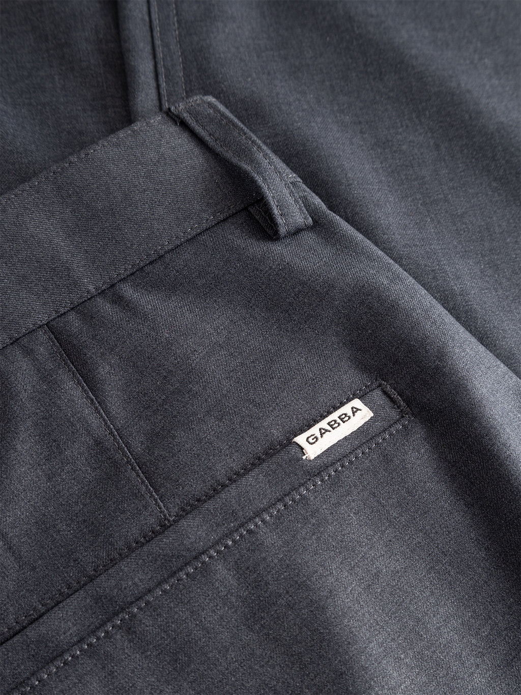 Close-up of the Gabba GABjoe Turnup Fin Pant in light grey, featuring a pocket with a small white fabric label reading “GAREBA” stitched to the seam.