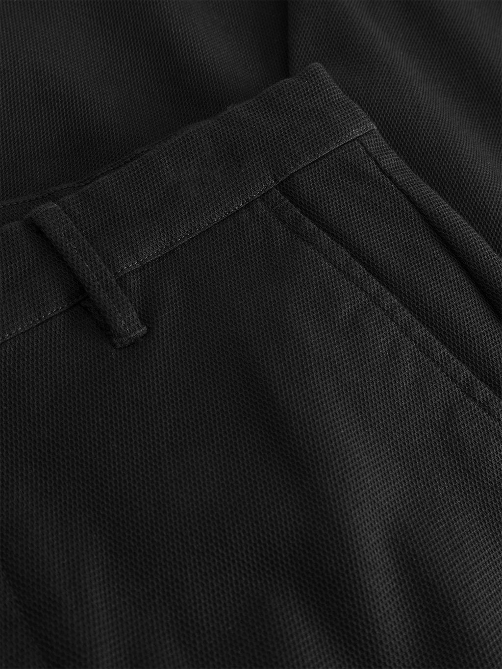 Close-up of the Gabba GABpaul L.C. Zip Crop Doby Pant in Blue Black, highlighting the waistband, belt loop, and side pocket with its subtly textured woven fabric.