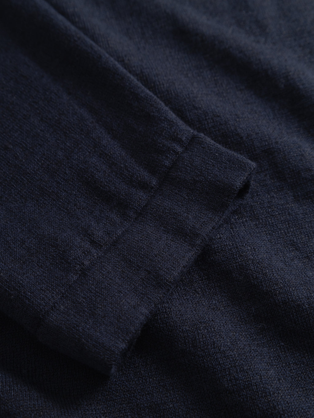 Close-up of the Gabba GABcross Dush LS Knit in Navy, showcasing the soft textured fabric, modern silhouette, and detailed cuff design.