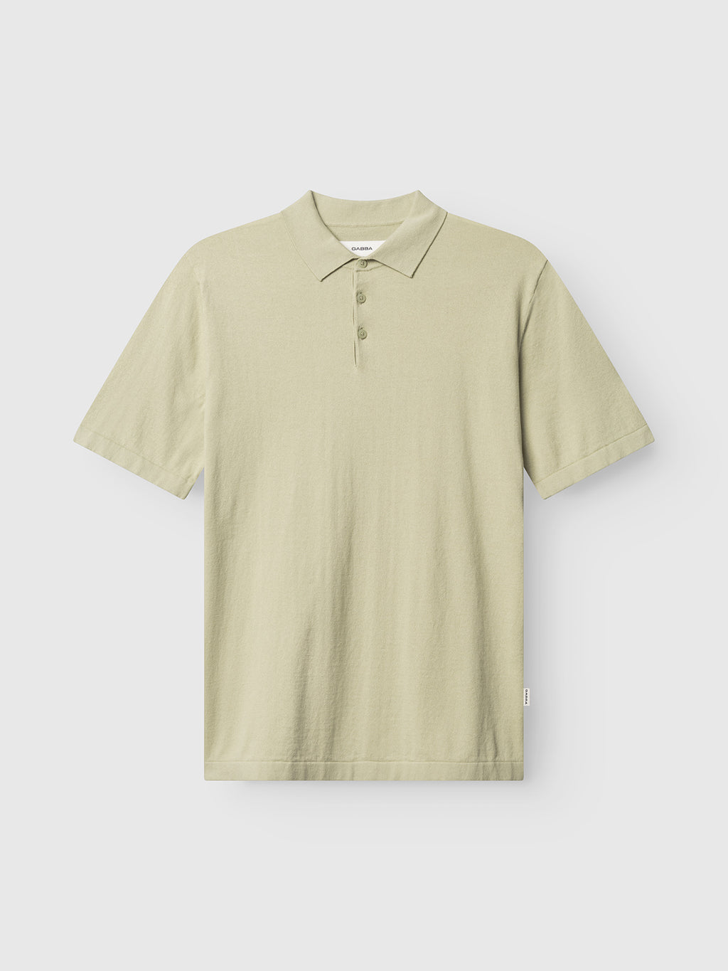 Gabba GABbenson New Cot SS Knit in Alfa Green: a men's short-sleeve polo with classic collar and three-button placket, shown on a plain white background.