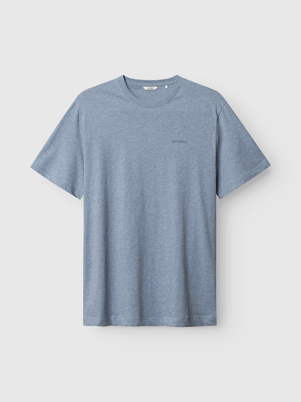 The GABdune Melange New SS T-Shirt by Gabba, in blue melange, is a soft jersey tee with short sleeves, a crew neckline, and a subtle Gabba logo on the left chest, shown against a light gray background.