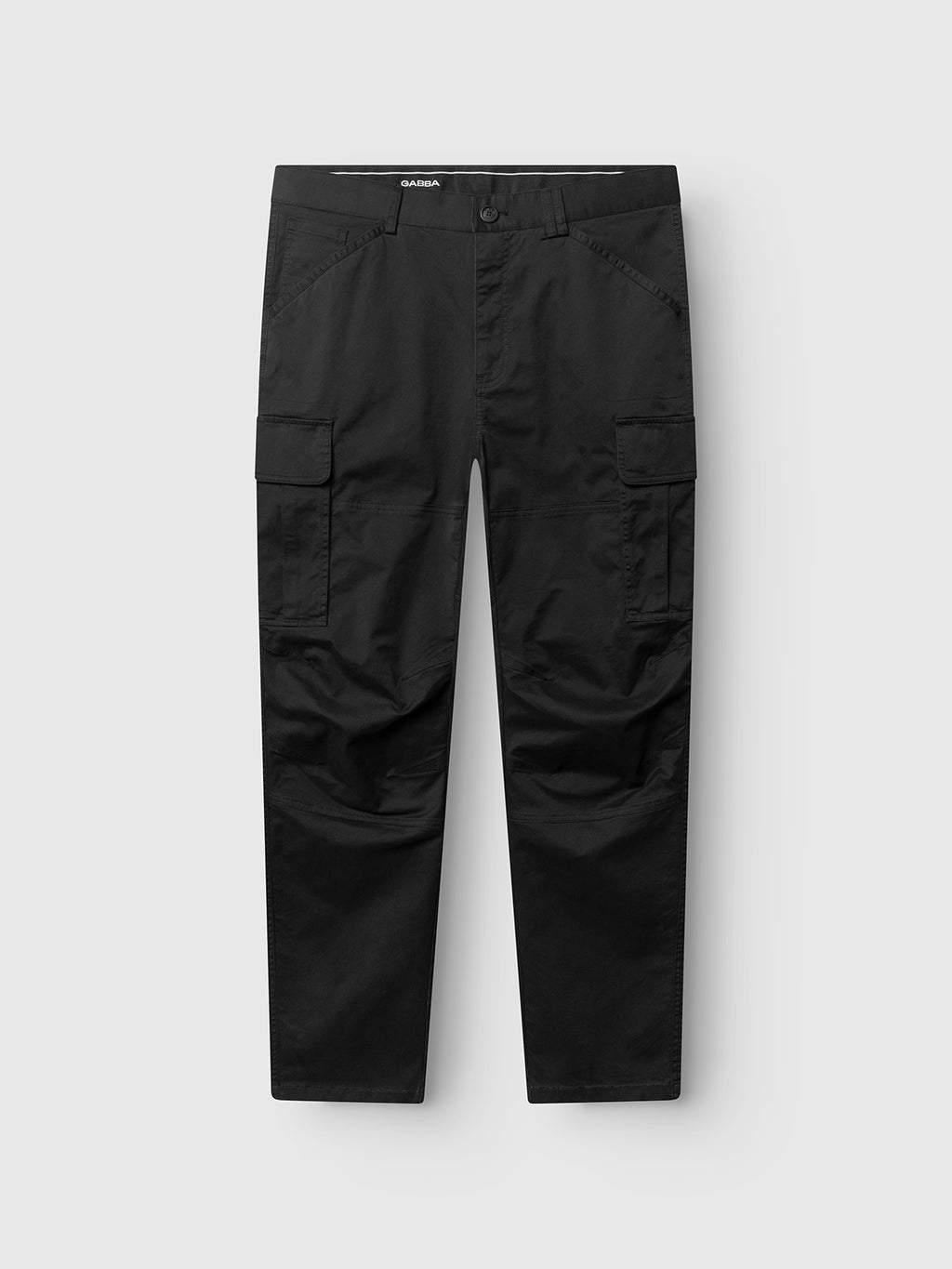The Gabba GABjoe Vico Cargo Pant in black is a pair of stretch cotton tapered cargo trousers with side pockets, front button and zipper closure, shown flat on a light gray background.