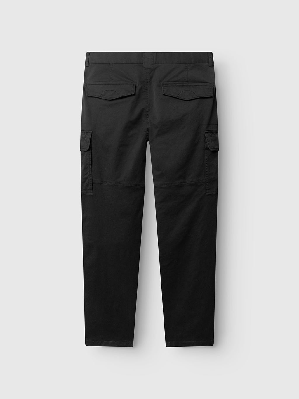 Back view of Gabba GABjoe Vico Cargo Pant in black, featuring tapered fit and flap pockets on back and sides, crafted from stretch cotton for comfort, shown against a light gray background.