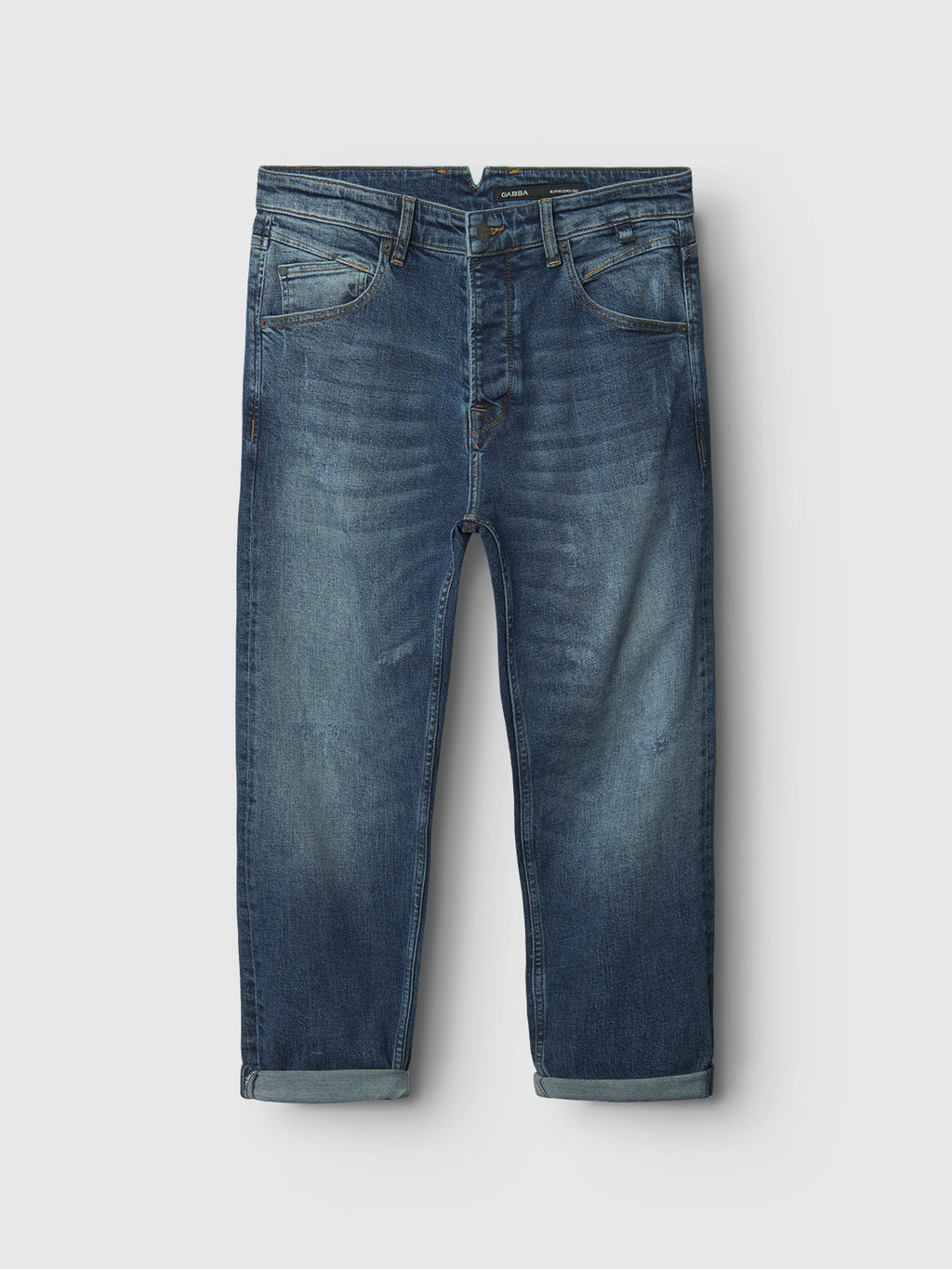 Introducing the Gabba GABalex Cros Cropped jeans in Mid Blue Denim—a relaxed fit pair crafted from recycled cotton cross hatch fabric. Featuring rolled cuffs, front and back pockets, and subtle faded detailing, these jeans are laid flat on a white background.