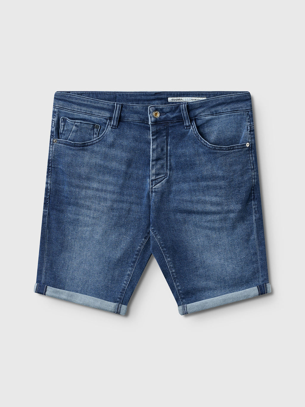 The Gabba Jason K3787 SANZA Shorts in mid blue denim feature super-stretch fabric, rolled-up hem, front and back pockets, button closure, and subtle fading. Shown laid flat on a light gray background.