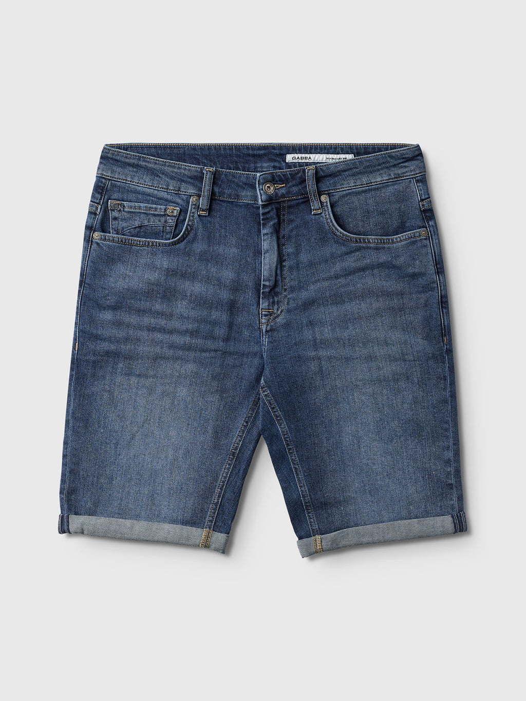 The Gabba Markus K4664 Shorts in mid blue denim are made from recycled cotton with rolled cuffs, five pockets, and a button-zipper closure, shown on a light gray background.