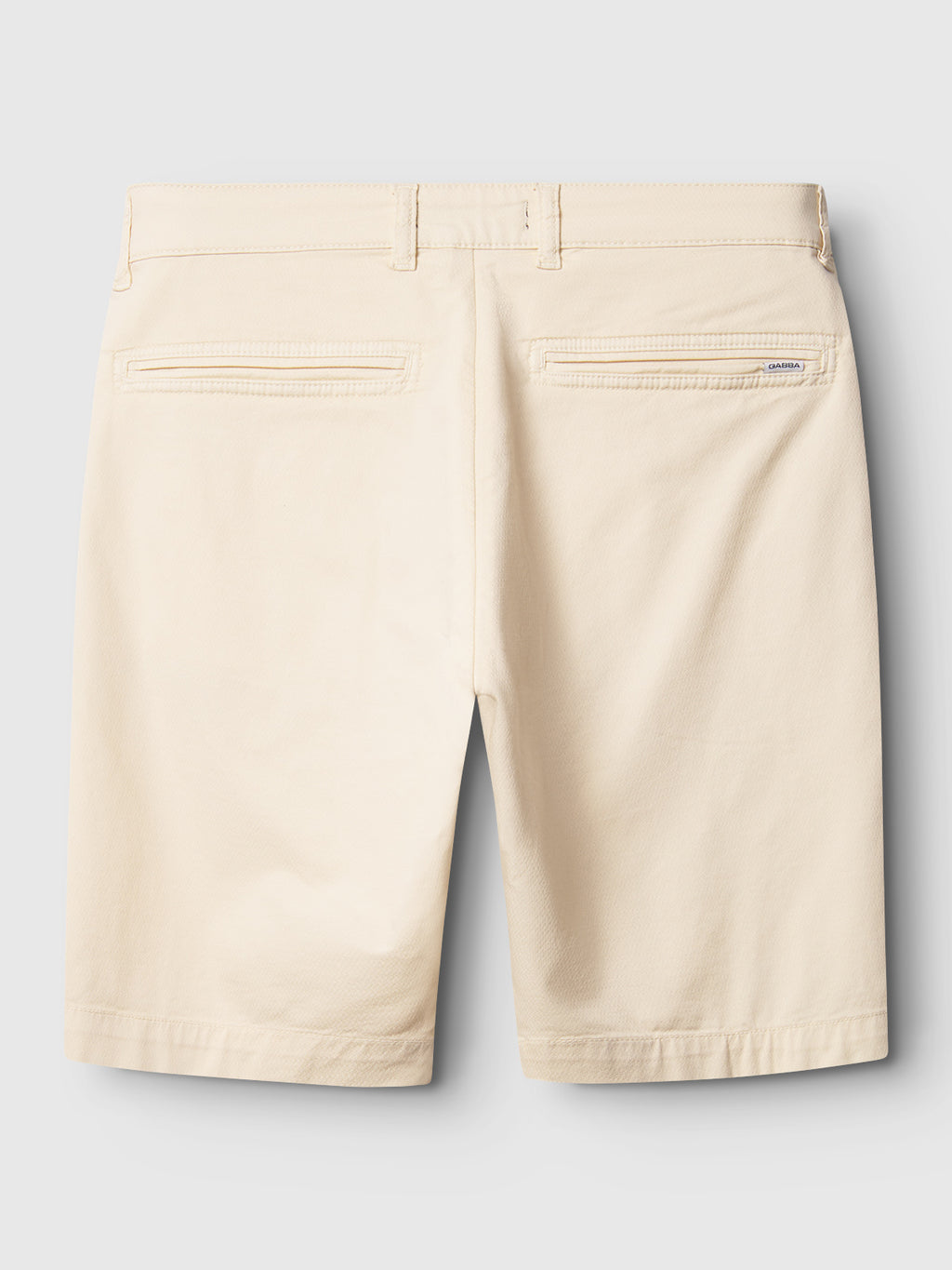 Back view of Gabba GABjet K3280 Dale Shorts in Ecru Light, featuring a relaxed fit, belt loops, and two welt pockets. Made from lightweight, slightly textured fabric for comfort. Shown against a plain light gray background.